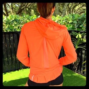 Lululemon 1/2 zip Rain Jacket in Bright Coral